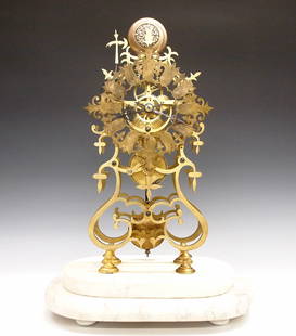 English Skeleton Clock: A late 20th century Brass Skeleton clock. 8-day Fusee driven movement with passing strike and Brass cut out dial with Roman numerals. Shaped Brass plates with turned posts on a stepped White Marble ba