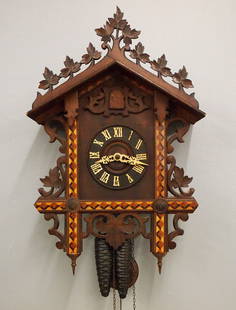 Black Forest Cuckoo & Quail Railway Wall Clock: An early 20th century German Black Forest Railway Cuckoo wall clock. 30-hr two weight movement with Brass cutout plates, Cuckoo chime at the hour and quarters, turned wooden dial with applied Roman nu