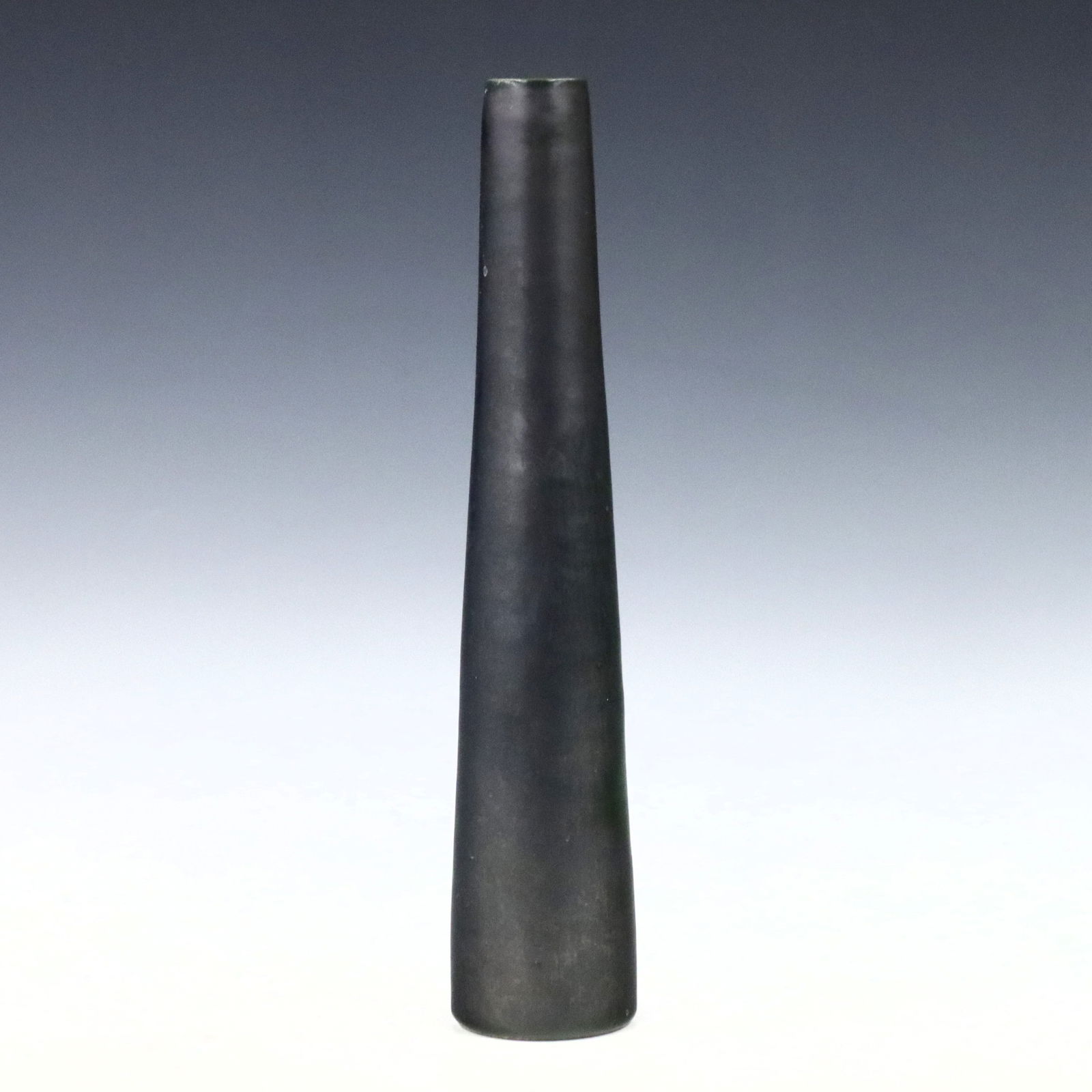 Raymor Pottery Vase: A Mid Century Modern Italian Raymor pottery vase. Tapered cylindrical form with Metallic Grey/Black glaze. Signed "Italy" with numerals "155--" and original paper label at underside. Minor surface wea