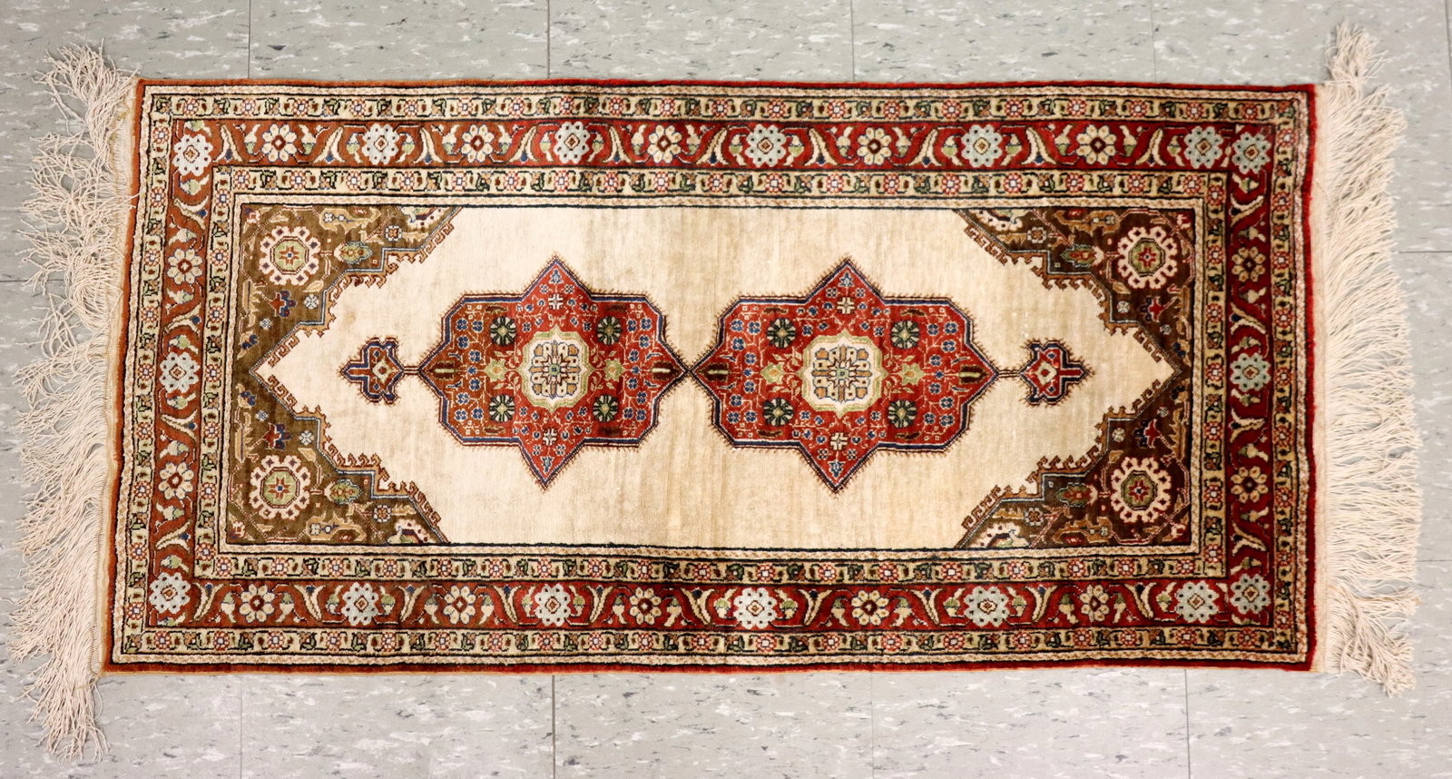 Silk Persian Tabriz Runner: A 1.9' x 3.9' Persian Silk Tabriz runner. Finely woven multi-color geometric design with two central medallions on an Orange/Red and Ivory field. Minor wear overall, a few small pulls and stains, slig