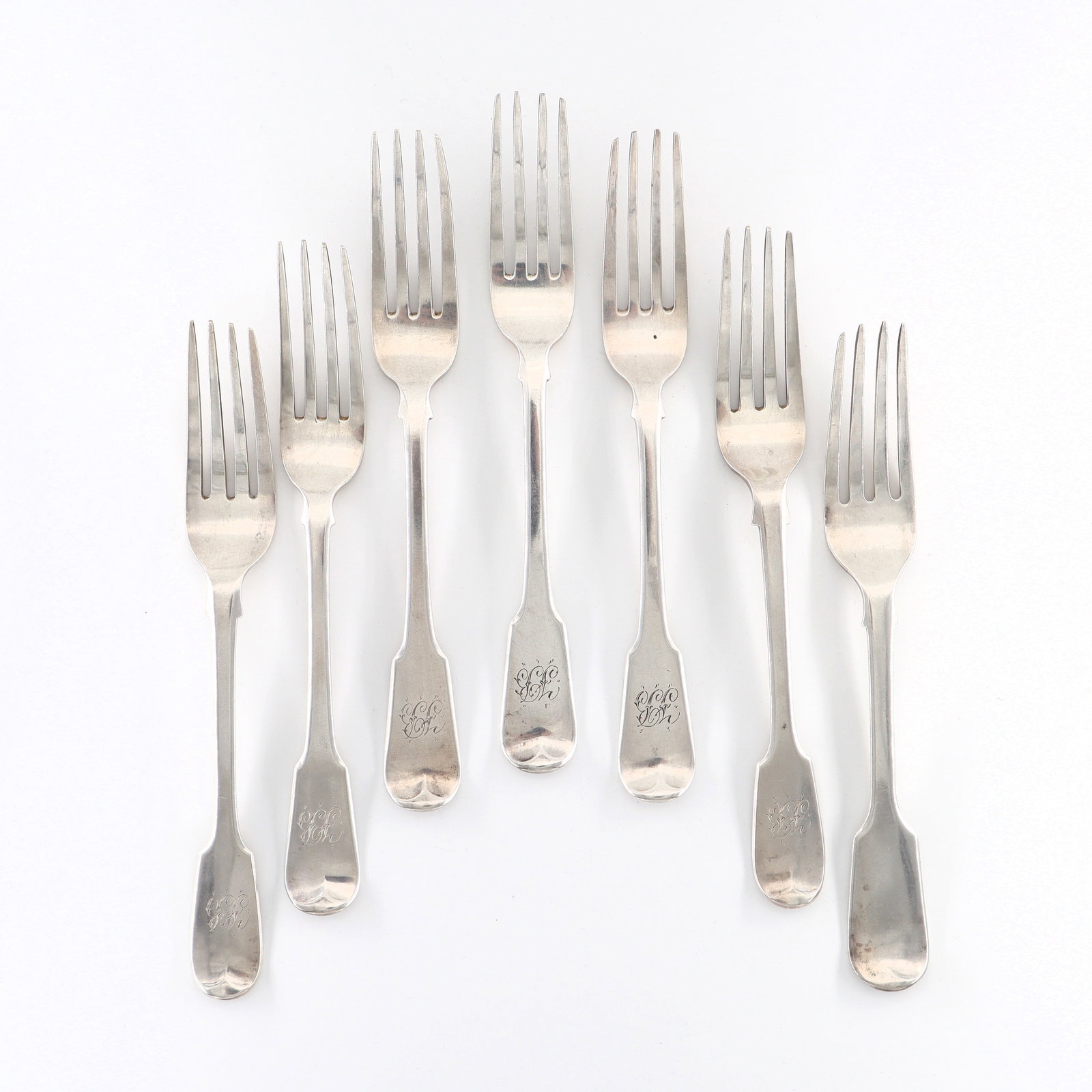 7 British Sterling Silver Forks: Seven early to mid 19th century British Sterling Silver forks by John Kerschner, c. 1815, Joseph & Albert Savory and Samuel Hayne & Dudley Cater, c.1840s. Impressed maker's marks and London hallmarks.