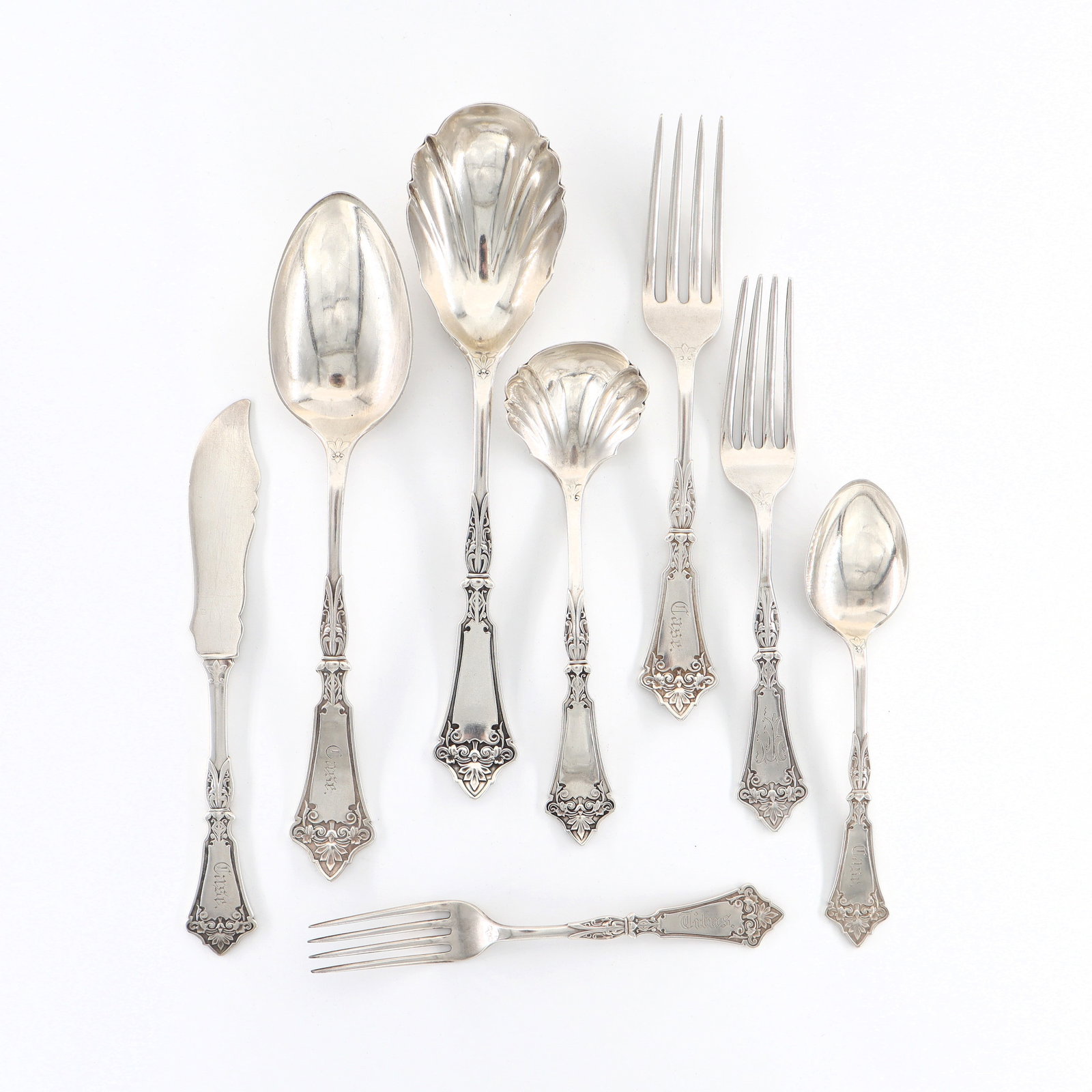 46 pc H & S Coin Silver Flatware: Forty-six pieces of late 19th century Hotchkiss & Schreuder Coin Silver flatware, c. 1870. Partial set, includes 4 x 6 7/8" salad forks, 12 x 7 1/2" dinner forks, 18 x 5 3/4" teaspoons, 6 x 8 1/2" ser