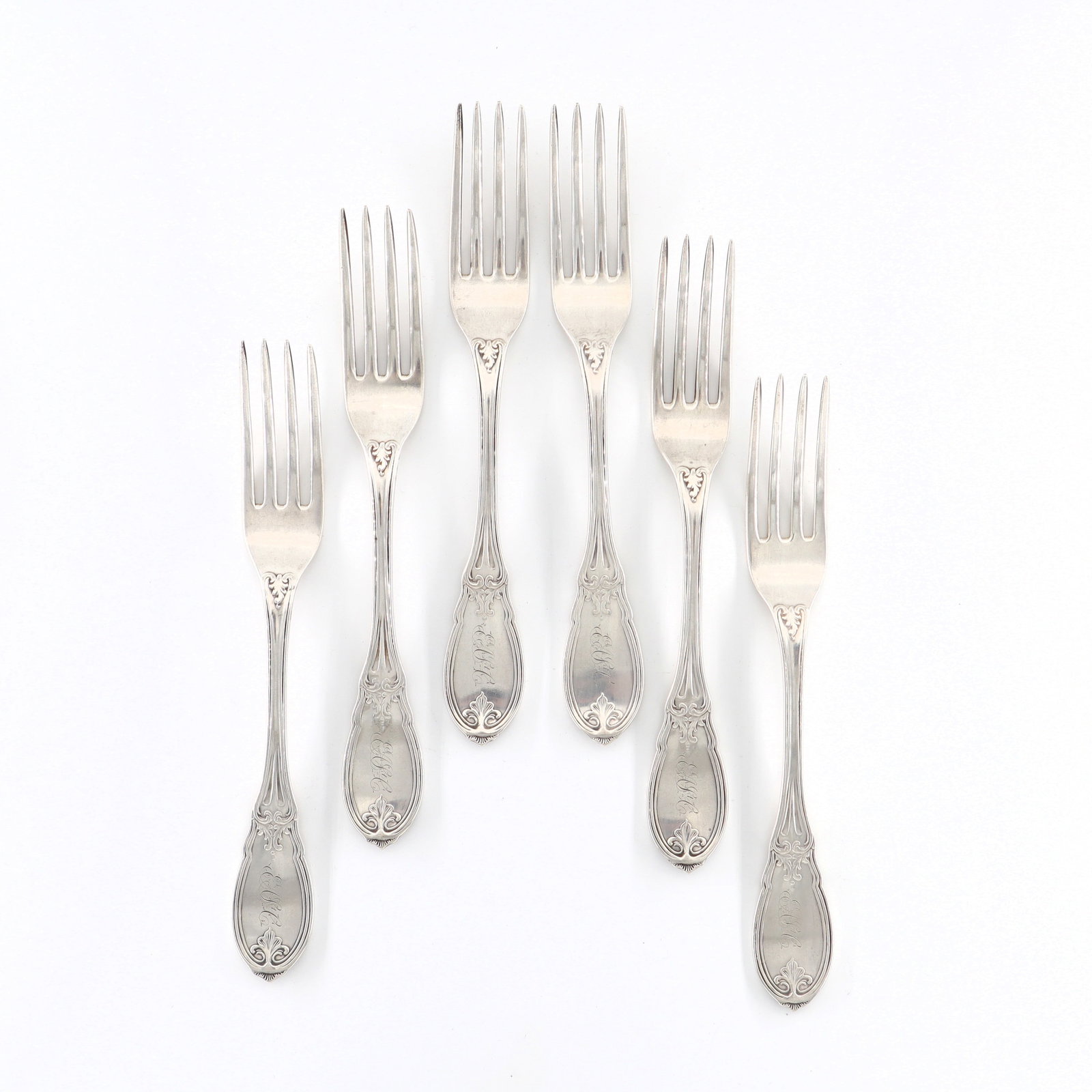 6 American Coin Silver Forks: Six mid 19th century American Coin Silver forks, c. 1850. Impressed "Standard" and "Patent 1850". 12.26 troy ozs total. Some surface wear, monogrammed. 7 3/4" long. ESTIMATE $200-400