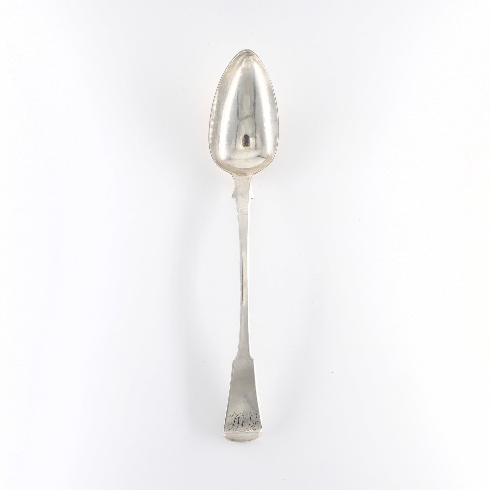 Lias George III Sterling Serving Spoon: An early 19th century British George III Period Sterling Silver serving spoon by John Lias, c. 1812. Impressed "IL" maker's mark and London hallmarks. 4.08 troy ozs total. Minor surface wear, monogram