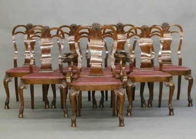 Burl Walnut dining set: An exceptional early 20th century English George I Style Walnut dining set with highly figured Burl veneers. All in Walnut with hand carved Shell knees and cabriole legs terminating in hairy cloven fe