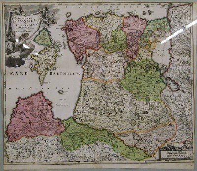 18th century Map: An 18th century Map of the Baltic States. Hand colored engraving on paper, by Homann, 1748 entitled "Dvcatvvm Livonae et Cvrlandiae". Some discoloration, center fold line, short edge tears with edge s