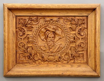 Renaissance Revival Carved Panel: A 19th century Renaissance Revival Period carved Oak panel. Central carved portrait medallion of a Knight within a scrolled foliate and berry border. Older finish with minor wear. Panel 20 3/4 x 14" h