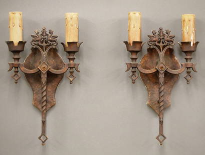 Pr Gothic Revival Sconces: A pair of early 20th century Gothic Revival Period sconces. Cast Aluminum bodies with Dragon design, double arms and patinated finish. Wear and oxidation to finish, some paint splatters, discoloration