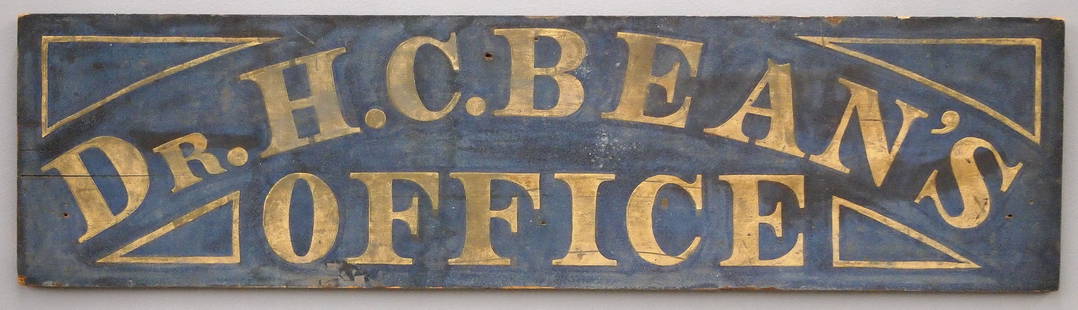 Wooden Trade Sign: A turn of the century wooden Trade Sign advertising "Dr. H C. Bean's Office". Single sided painted wooden sign with Gold lettering on a Blue schmaltz background. Some surface wear. 44" long x 11 1/2"