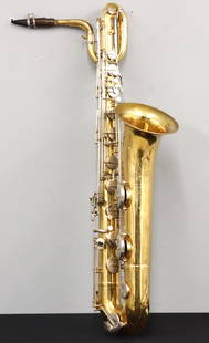 Selmer Bundy Saxophone: A 1960's Selmer "Bundy" saxophone. Brass instrument with Mother of Pearl keys and hard shell case. Engraved "Bundy / H & A Selmer Inc." at bell and "Made in Germany" with serial # "54386" at body. Sur