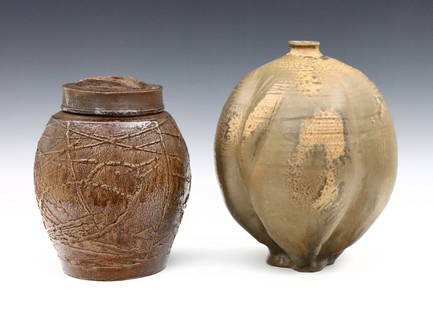 Stoneware Jar & Vase: An early to mid 20th century Stoneware jar and vase. Includes a covered jar with threaded decoration and Brown glaze, and a gourd form vase with Brown salt glaze. Both with unidentified marks at base