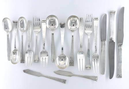 17 pc Adler Sterling Flatware: Seventeen pieces of 20th century Allan Adler Sterling Silver flatware. Includes two single sets of six piece place settings in "Chinese Key" and "Modern Georgian" patterns, and a five piece place sett