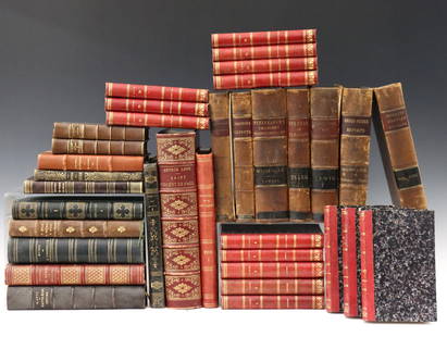 35 Antique & Vintage Books: Thirty-five 19th and 20th century books. Partial and full leather bindings, includes 15 vols. with the works of Eugene Scribe (c. 1850's) and others. Overall wear, some damage. Up to 12" high. ESTIMAT