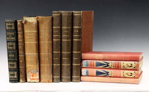 11 Antique & Vintage Books: Eleven 19th and 20th century books. Leather and cloth bindings, includes 2 vols. with the works of Jules Verne, 3 vols of "La Vie Parisenne" and others. Overall wear, some damage. Up to 13 3/4" high o