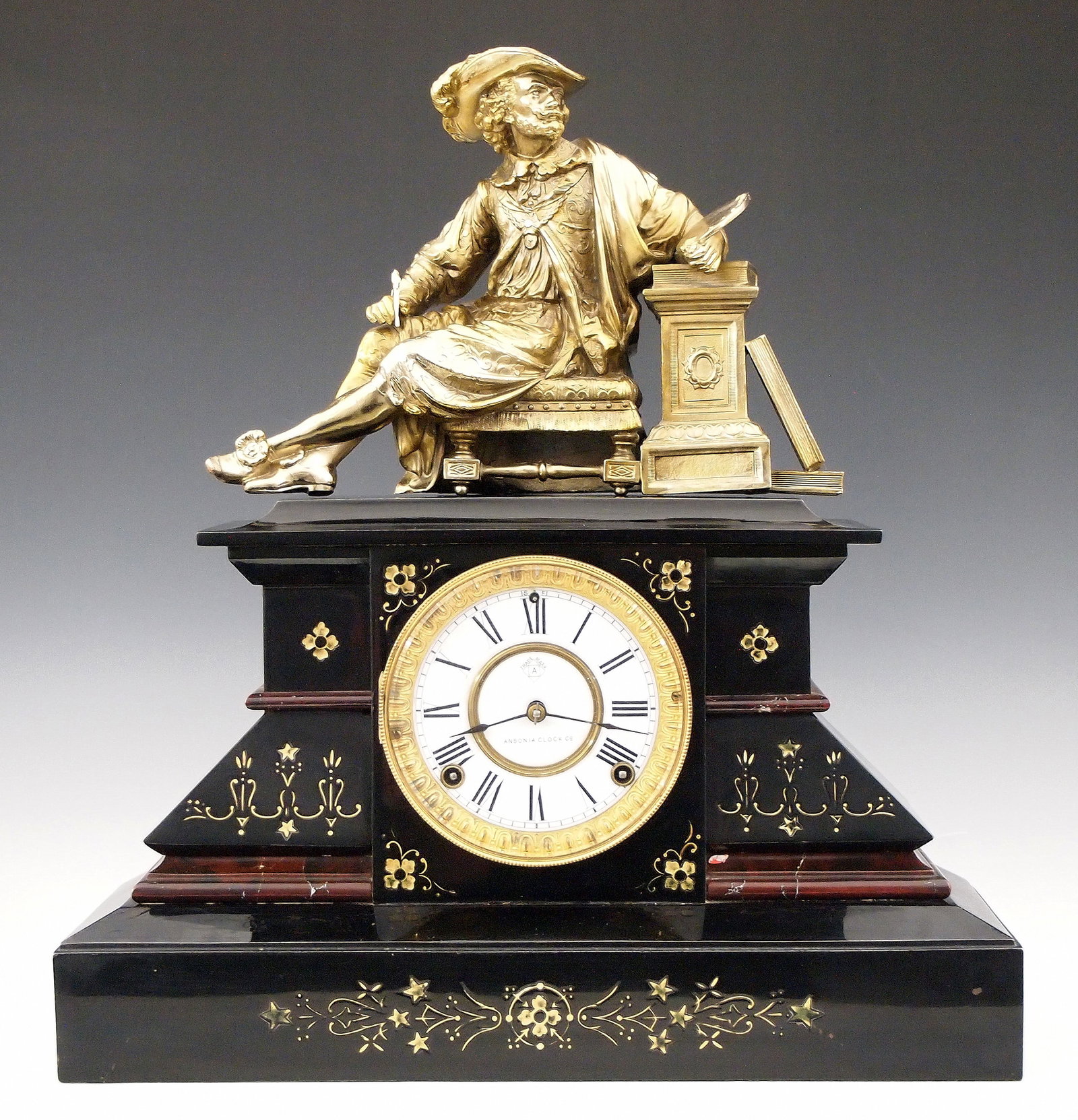 Ansonia Marbelite No. 6 Iron Mantel Clock: A late 19th century Ansonia Marbelite No. 6 model enameled Iron mantel clock. 8-day time and strike movement with two part porcelain dial with Roman numerals. Black enameled Iron case with molded top,