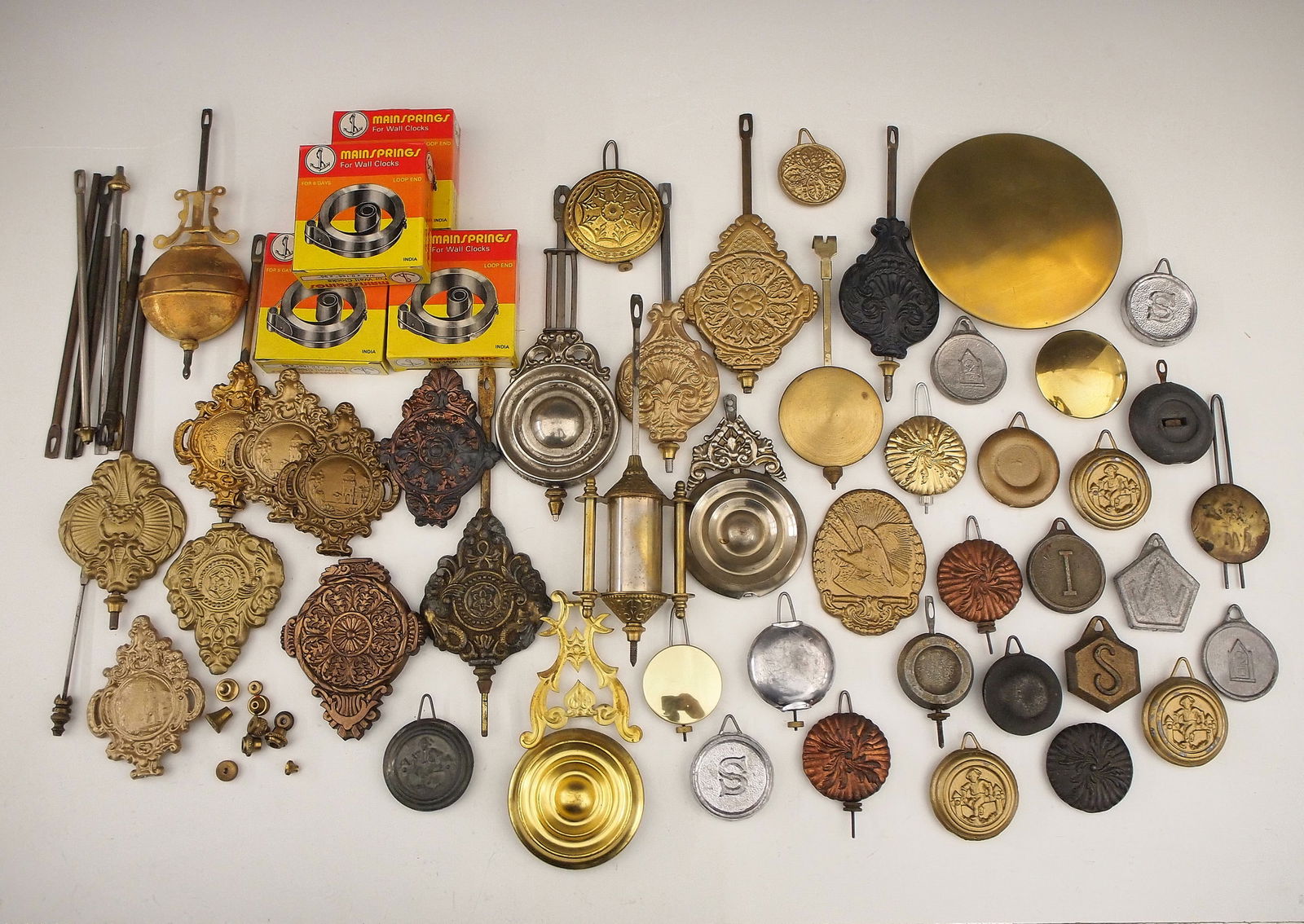 Clock Pendulums And Springs (1 of 1)