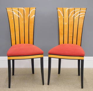 Pr Saarinen Cranbrook Dining Chairs: A pair of 1980's Eliel Saarinen "Cranbrook" dining chairs. Maple construction with Black lacquer detail featuring molded backs with scalloped design, upholstered seats and splayed legs. 