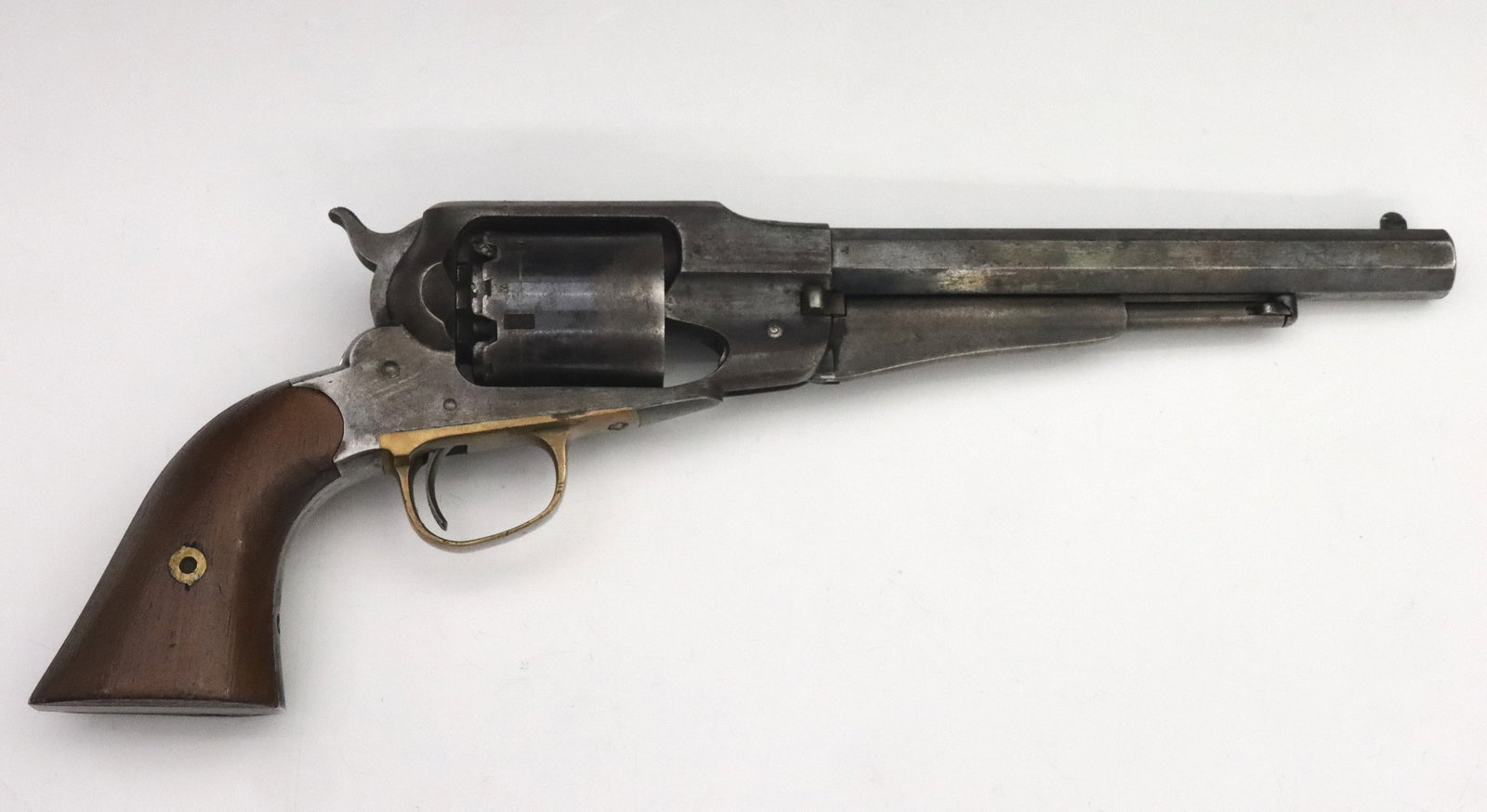 Remington New Model Army Revolver: A Civil War Period Remington New Model Army Revolver. .44 Caliber, 6 shot, 8" barrel, Walnut grips with Brass trigger guard. Serial #51754 at underside of barrel, marked "Remington & Sons. Ilion. New 