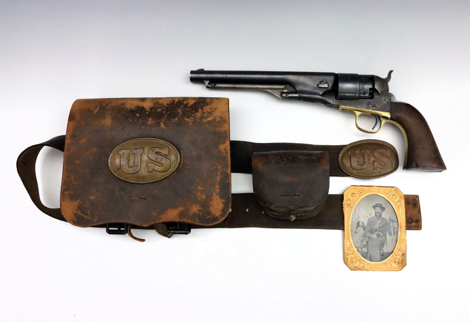 3 Civil War Collector's Items: Three Civil War Period collector's items. Includes a Colt Model 1860 Army Revolver, a belted Leather cartridge pouch with ammo tins, Brass plate and buckle, and a quarter plate Tintype of a Union sold