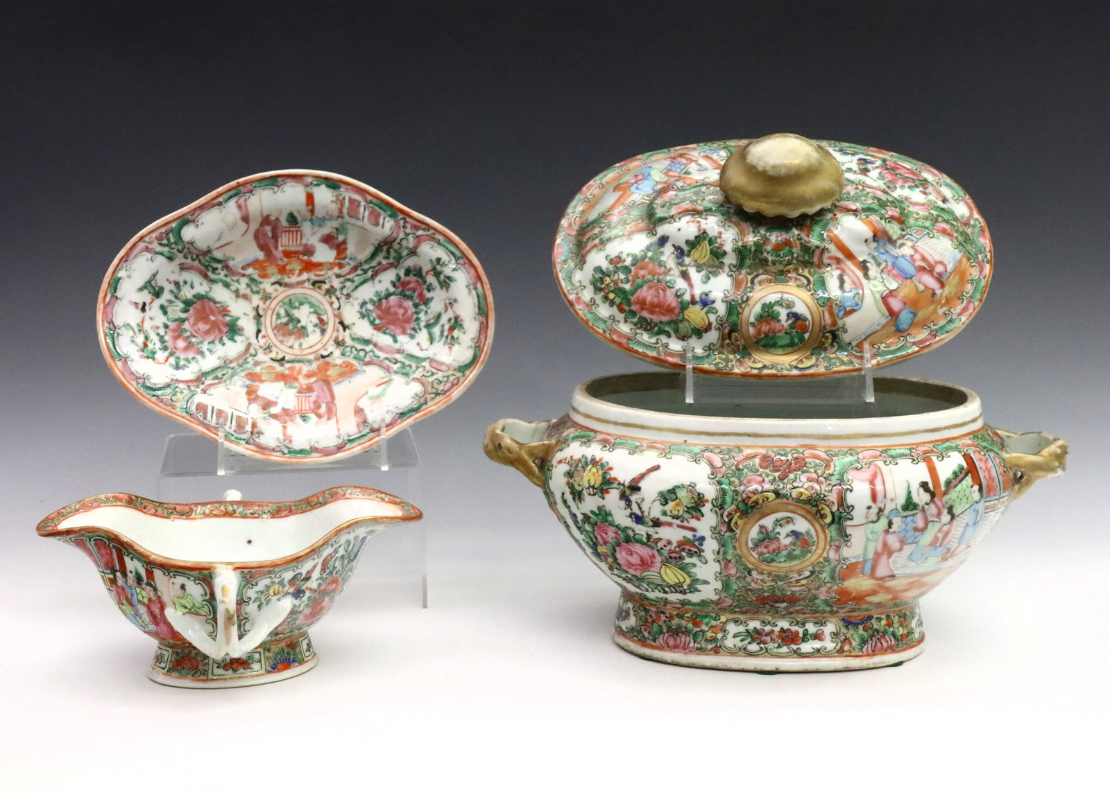 Chinese Rose Medallion Tureen & Gravy: A turn of the century Chinese Rose Medallion porcelain tureen and gravy with underplate. Polychrome vignette panels depicting alternating floral and Court scenes with Gilded detail. One tureen handle 