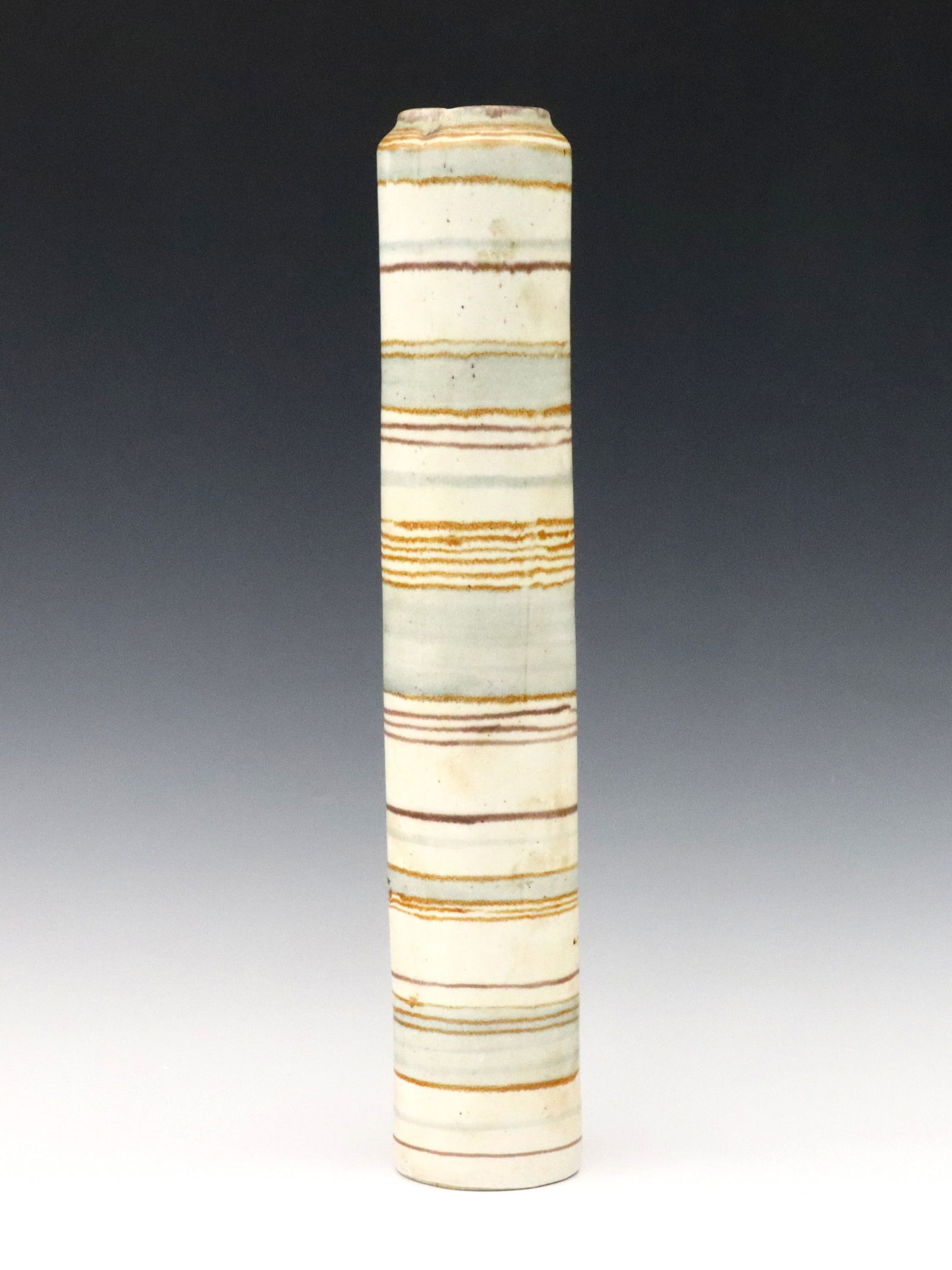 Glidden Chow Stoneware Vase: A mid 20th century Glidden "Gulfstream" Stoneware vase designed by Fong Chow. Tall cylindrical form with multi-color banded decoration. Painted "Glidden" mark and "Made in U.S.A." at underside. Minor