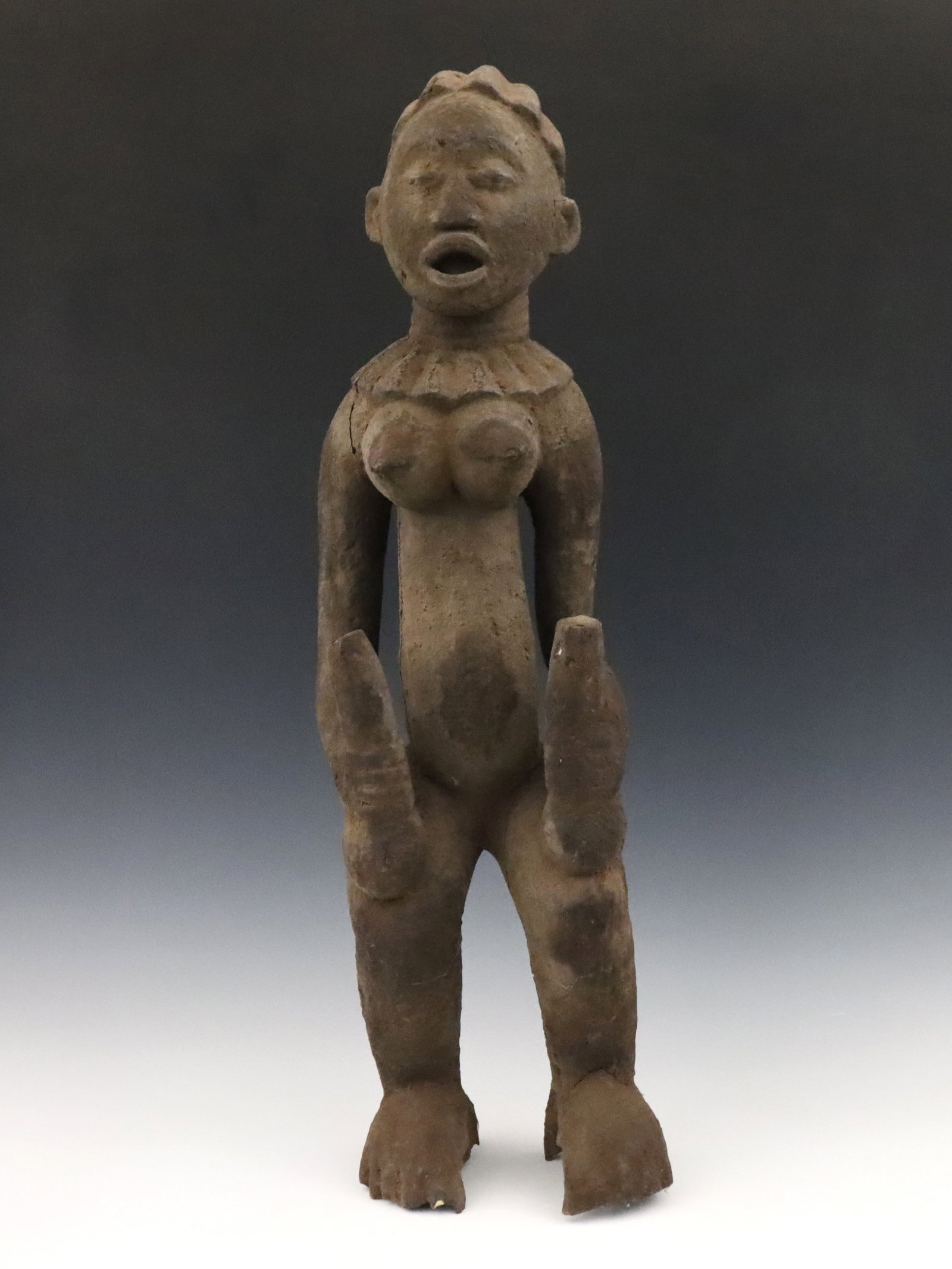 Cameroonian Carved Bangwa Figure: A Cameroonian carved wooden Bangwa female figure. Some wear and minor damage. 32" high. ESTIMATE $200-400 NOTE: From the collection of Fred Brown, Brighton, Michigan. Purchased in Africa during the 19