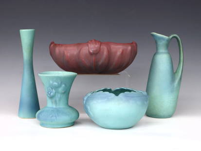 5 pc Van Briggle Ming Blue Pottery: Five pieces of 20th century Van Briggle Art Pottery. Includes a slender bud vase, a baluster form ewer, flared vase and floriform rose bowl with "Ming" Blue matte glaze, and an oval scalloped vase wit