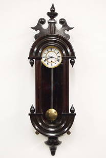 Mini Vienna Regulator Wall Clock: A late 19th century miniature Vienna Regulator wall clock. 2-day spring driven time only movement with two part porcelain dial and Roman numerals within a molded Brass bezel, steel pendulum shaft