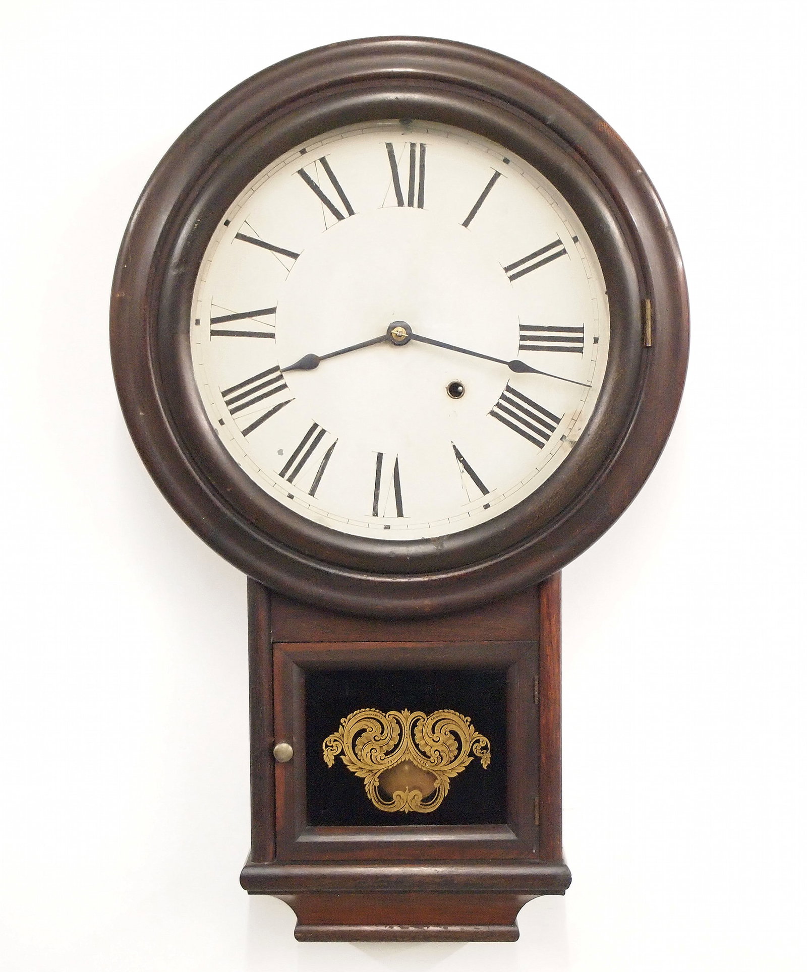 Welch Spring & Co. Round Head Drop Model Wall Clock: A 19th century Welch Spring & Co. Round Head Drop model wall clock. 8-day time only, in-line movement with painted metal dial and Roman numerals. Rosewood case with molded top and dial door over a sho