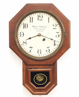 Seth Thomas Ball Standard Model Wall Clock: A late 19th century Seth Thomas "Ball Standard" model wall clock. 8-day time only movement with papered metal dial and Arabic numerals marked "Ball Standard, Cleveland, O., Pat. Apld For". Walnut case