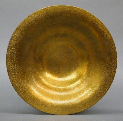 Tiffany Bronze bowl: A turn of the century Tiffany Bronze bowl with simple flared rim and Gold patinated finish. Marked "Tiffany Studios, New York, 1708". Slight surface wear. 9" diameter. ESTIMATE $200-400