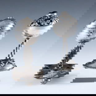 2 Russian Silver Judaic Spice Towers: Two Russian Silver Judaic spice towers. Includes an 18th century tower with a pierced lift-off cover and Amber cabochon, on tripod legs and domed Star of David base, and a 19th century tower with a