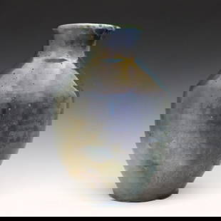 Pewabic Pottery Vase: An early 20th century Pewabic Art Pottery vase. Baluster form with Iridescent glaze in shades of Blue and Gold. Faintly impressed "Pewabic Detroit" mark. Minor wear. 7 3/4" high. ESTIMATE