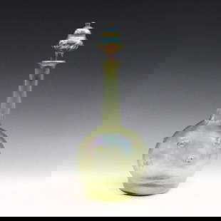 Tiffany Favrile Glass Decanter: An early 20th century Tiffany Favrile glass decanter. Bulbous form with "pigtail" prunts and Iridescent Green finish. Signed "L.C.T." and "R7698" at underside, stopper marked "98". Minor surface