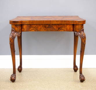 George I Style Games Table: A 1920's George I style games table. Bookmatched Burl Walnut construction with flip-open turret top, concertina support and sliding card tray on four cabriole legs with shell carved knees and