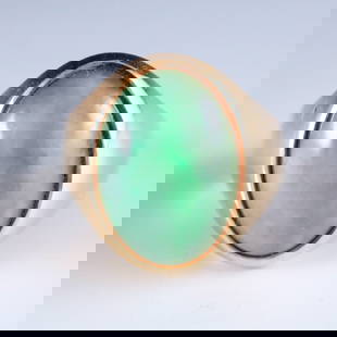 14k Gold & Jade Gent's Ring: A vintage 14k Gold gent's ring with oval Jade cabochon. Marked "14k" and "585". 14.1 grams total. Some surface wear. Size 9 1/2. ESTIMATE $400-600