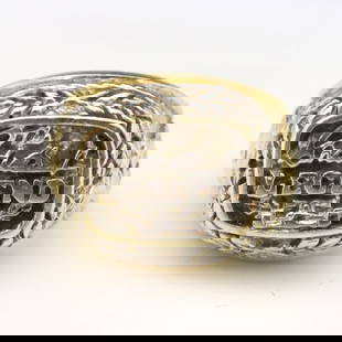 14k Gold Gent's Indy 500 Ring: A 14k Gold gent's Indianapolis 500 ring with engraved driver's facsimile signature and two-tone accents. Marked "14k". 21.7 grams total. Some surface wear. Size 10. ESTIMATE $1,000-2,000