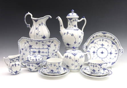 33 pc Royal Copenhagen Tableware: Thirty-three pieces of 20th century Royal Copenhagen "Blue Fluted Half Lace" porcelain tableware. Includes a coffee pot, teapot, creamer and sugar with undertray, eight teacups with saucers, a