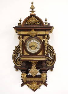 Fancy Lenzkirch Frieswinger Wall Clock: A late 19th century Lenzkirch Frieswinger wall clock. 8-day spring driven time and strike movement with etched Brass dial, Roman numerals and molded Brass bezel and fancy cast pendulum, serial