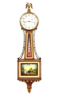 Waltham Model 904 Banjo Clock: A 20th century Waltham model 904 Banjo clock. 8-day Brass, weight driven time only movement with Geneva stops marked "Waltham Watch Co. U. S. A." with painted Iron dial and Arabic numerals marked "Wal