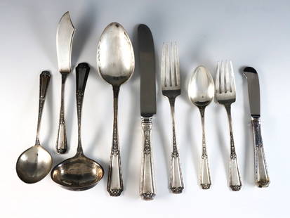 44 pc Towle Louis XIV Sterling Flatware: Forty-four pieces of Towle "Louis XIV" pattern Sterling Silver flatware. Features 8 five-piece place settings plus serving utensils. Includes 8 x 8 1/2" hollow handle dinner knives, 8 x 5 3/4"