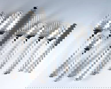 82 pc Gorham Fairfax Sterling Flatware: Eighty-two pieces of Gorham "Fairfax" pattern Sterling Silver flatware. Features 12 six-piece place settings plus additional flatware and serving utensils. Includes 12 x 9 1/2" hollow handle dinner