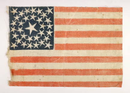 American 33 Star Parade Flag: A mid 19th century American 33 Star parade flag celebrating Oregon's admission into the Union, c. 1859-1861. Printed cotton flag with raw edges features thirty-three White stars on a Blue canton in do