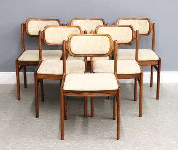 6 J. Andersen Dining Chairs: A set of six Danish Modern dining chairs by Johannes Andersen for Uldum Mobelfabrik. Rosewood construction with upholstered backs and seats on tapered legs. Retain original "Uldum Mobelfabrik / Made i