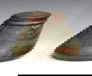 Tiffany American Indian Bronze Inkwell: A turn of the century Tiffany "American Indian" pattern Bronze inkwell. Conical form with cast Native American style design, glass insert and patinated finish. Impressed "Tiffany Studios / New York /