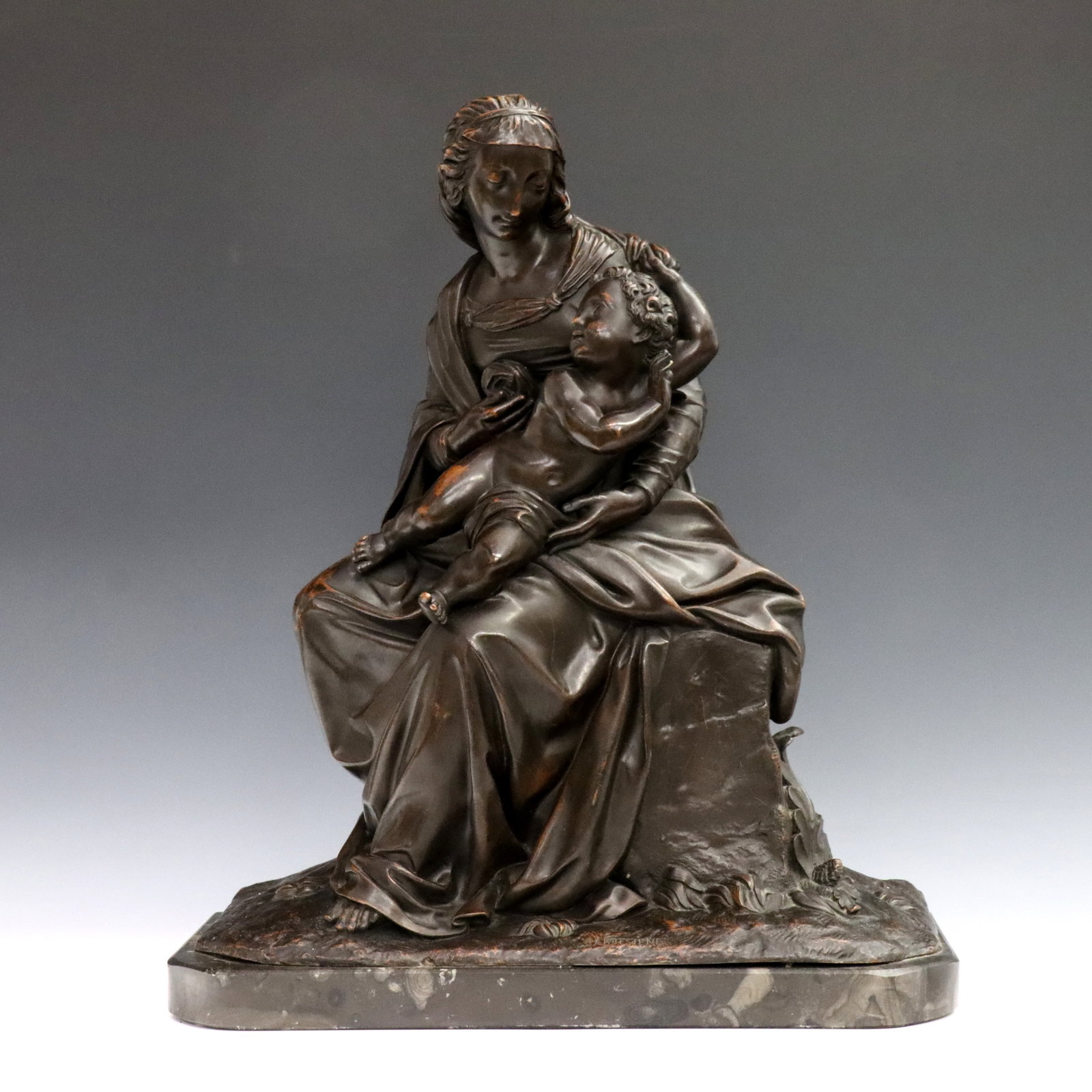 Copper Clad Figure of Mother & Child: A mid 20th century Copper clad figure of a Mother and Child with Bronzed patina on a St. Anne's Grey Marble base. Marked "Barbesiene" in the manner of Barbedienne at front, illegible signature at side