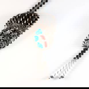 Native American Sterling Bear Claw Bolo Tie: A vintage Native American Sterling Silver bolo tie with Bear Claw design. Features a paw shaped clasp with five incorporated Bear claws and bezel set Turquoise and Red Coral accents, on a braided leat