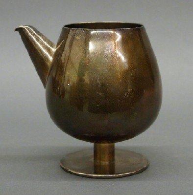 Wm Spratling Silver Cocktail goblet: A mid 20th century William Spratling (Taxco) Sterling Silver Cocktail mixing goblet. Bulbous body with pouring spout and interior strainer with a short cylindrical stem and flat circular foot. Bench m