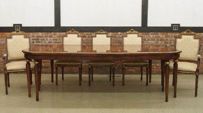 11 pc Italian dining set: A 1970's eleven piece Italian Neoclassical style dining set. Burl Walnut with inlaid design and Gilded detail by Arredemti, Italy. Includes an eight leg extension table (50 x 90 {plus two 19 1/2" leav