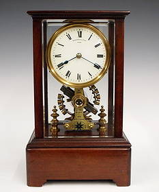 Eureka Electric Clock: An early 20th century Eureka Electric clock. 3 v electric movement with convex porcelain dial and Roman numerals marked "Eureka Clock Co. Ltd., London" movement marked "Patent 14614, 1906, Made In Eng